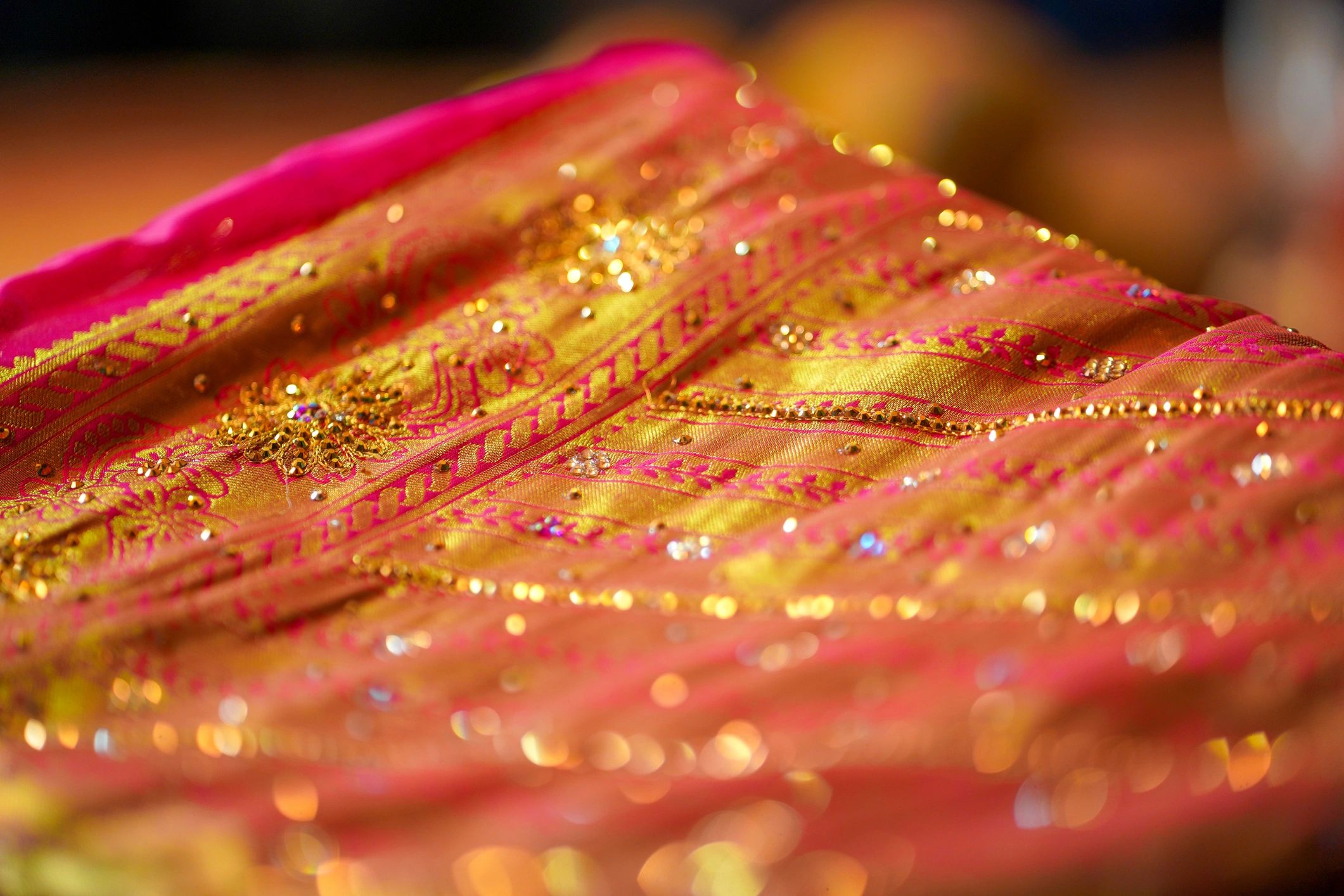 Close-up texture of a silk saree fabric