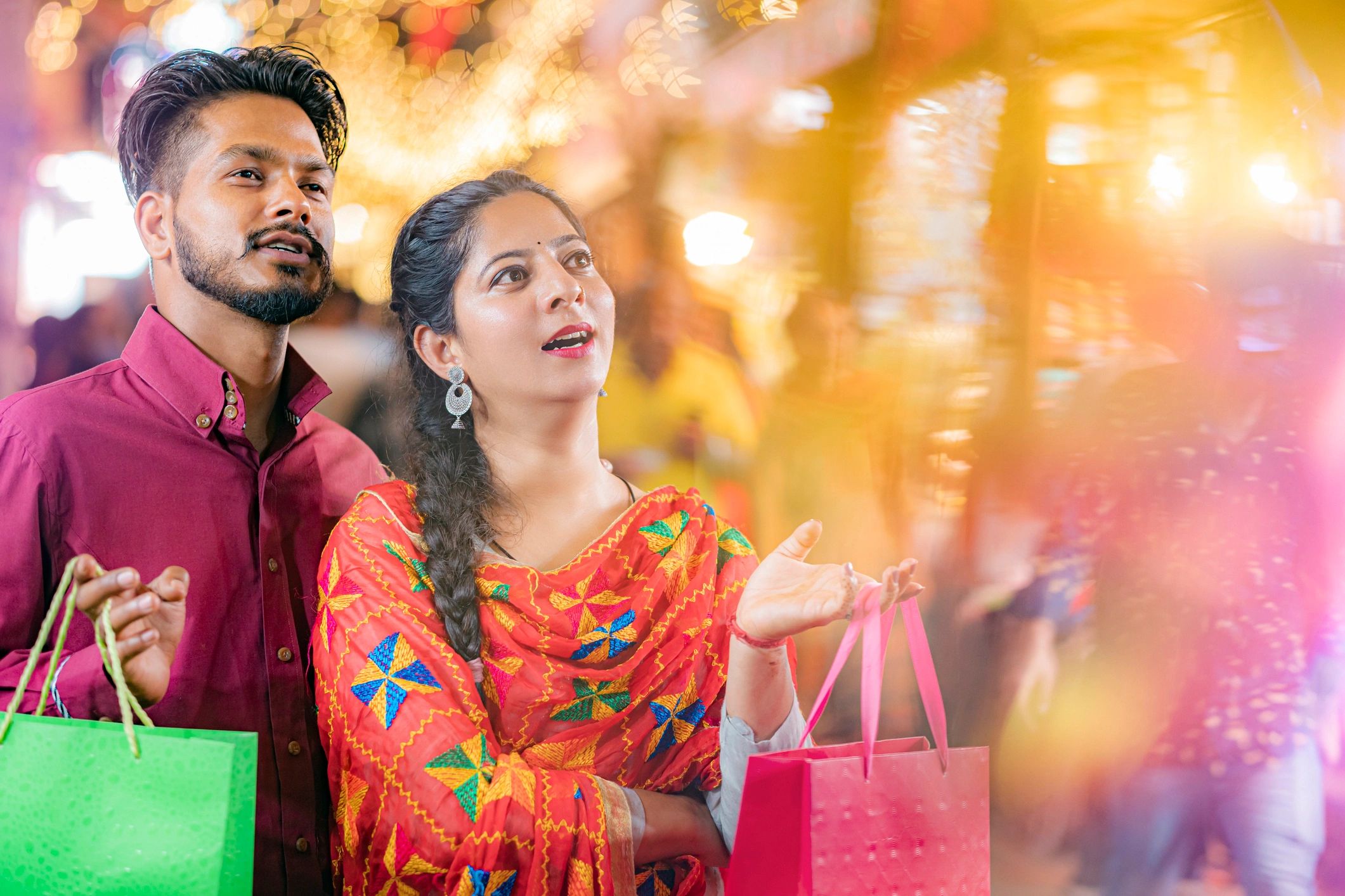 Happy couple shopping together