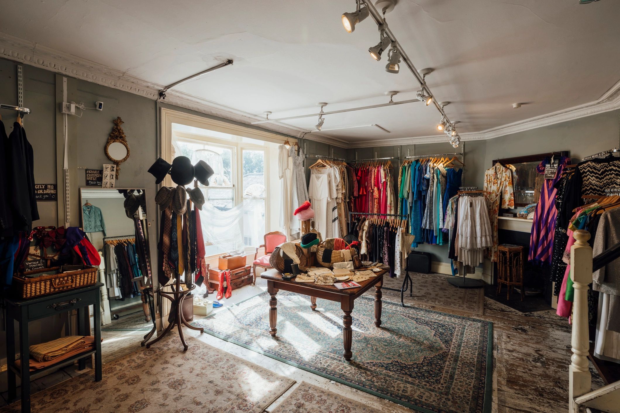Clothing store interior with varied merchandise on display