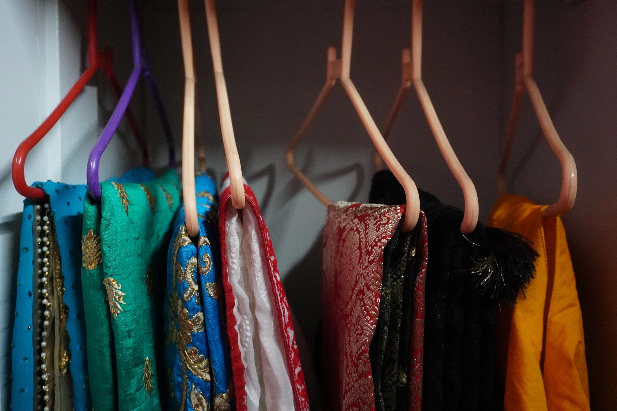 Traditional Indian sarees arranged on hangers